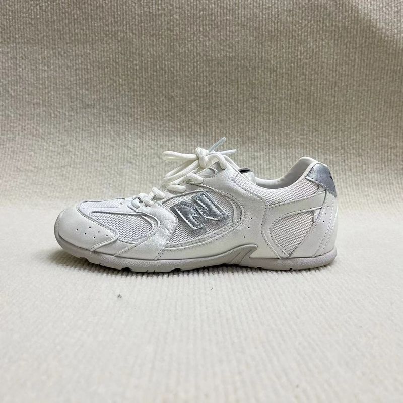 Women N-word flat running shoes breathable and casual with net surface