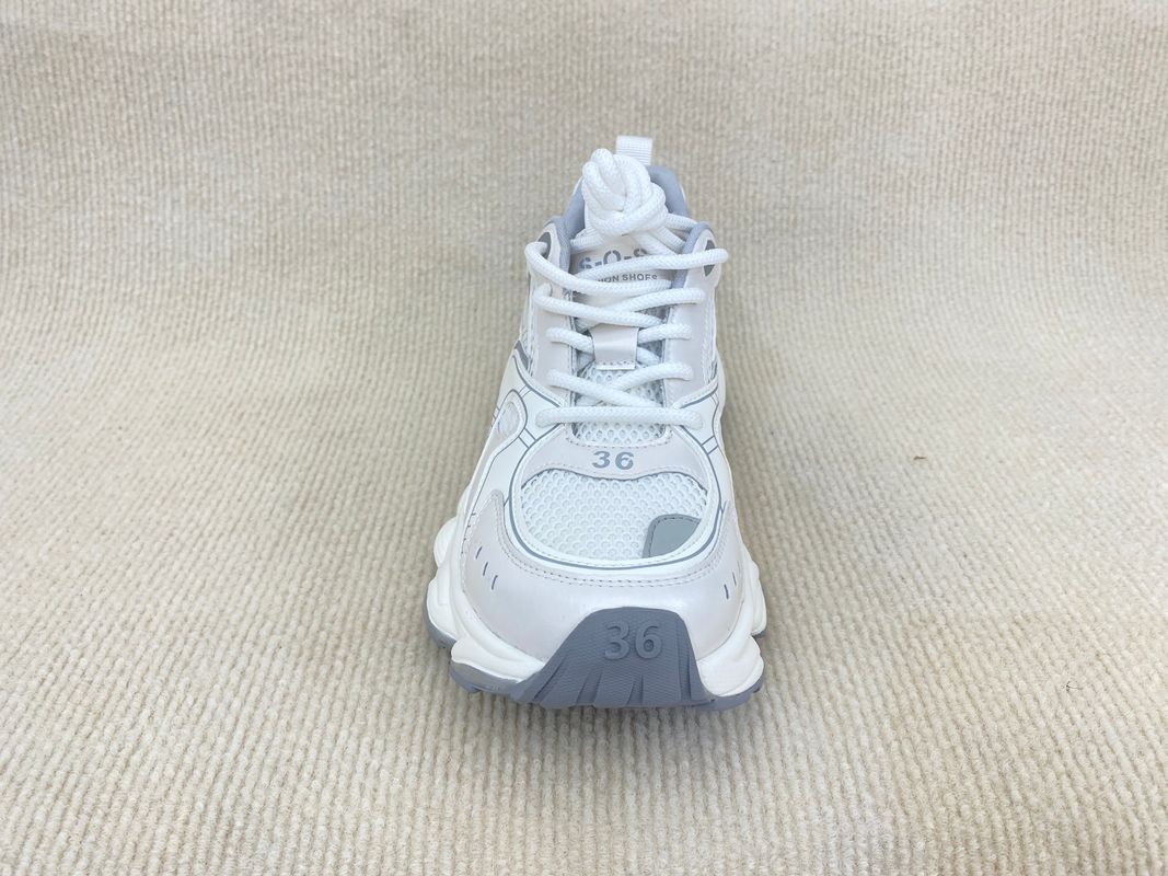 Women white running shoes with thick soled and breathable mesh upper